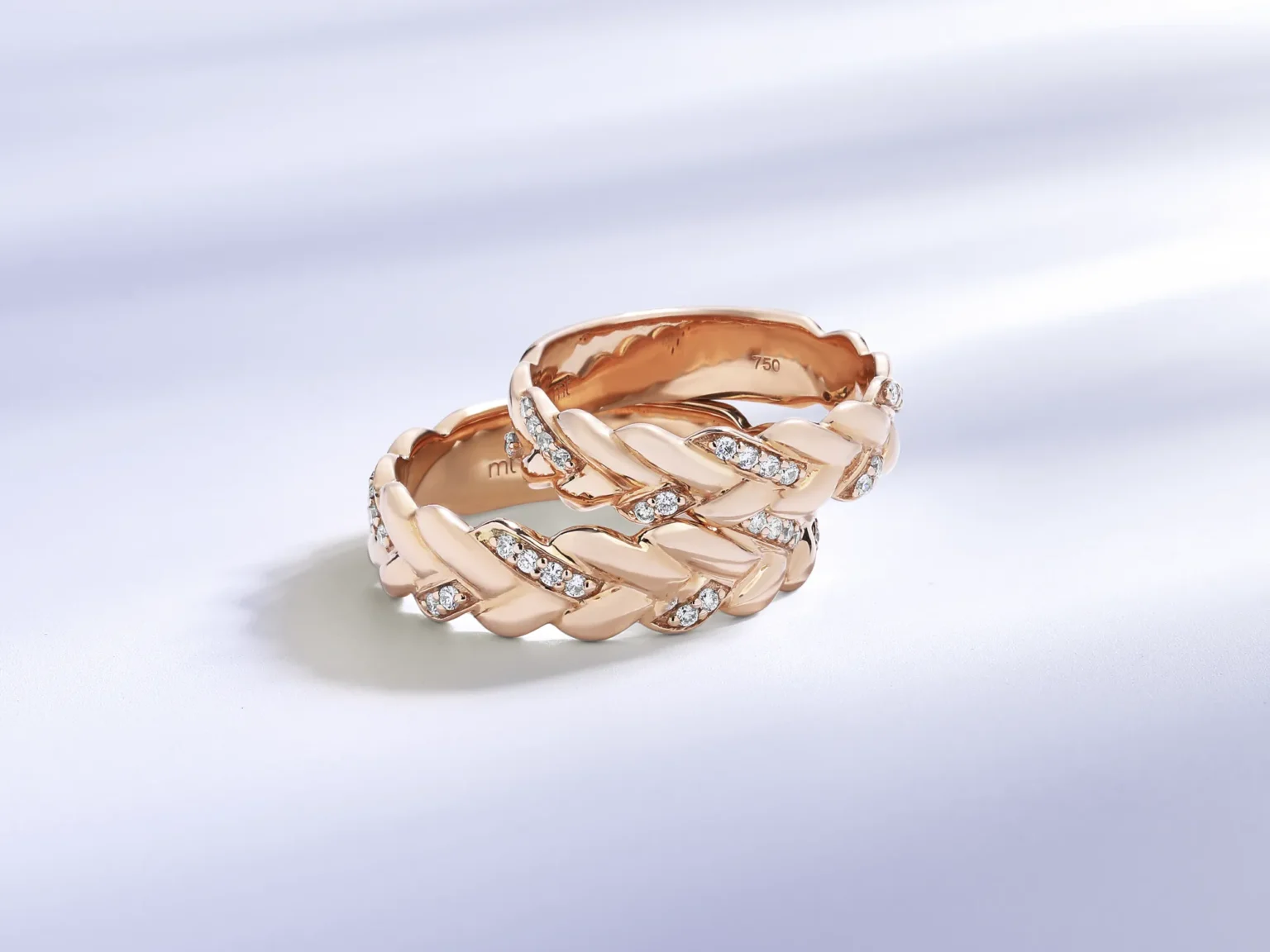 Rose gold braided ring with pav&eacute; diamonds photographed by Productpixels jewellery photography studio in Singapore.