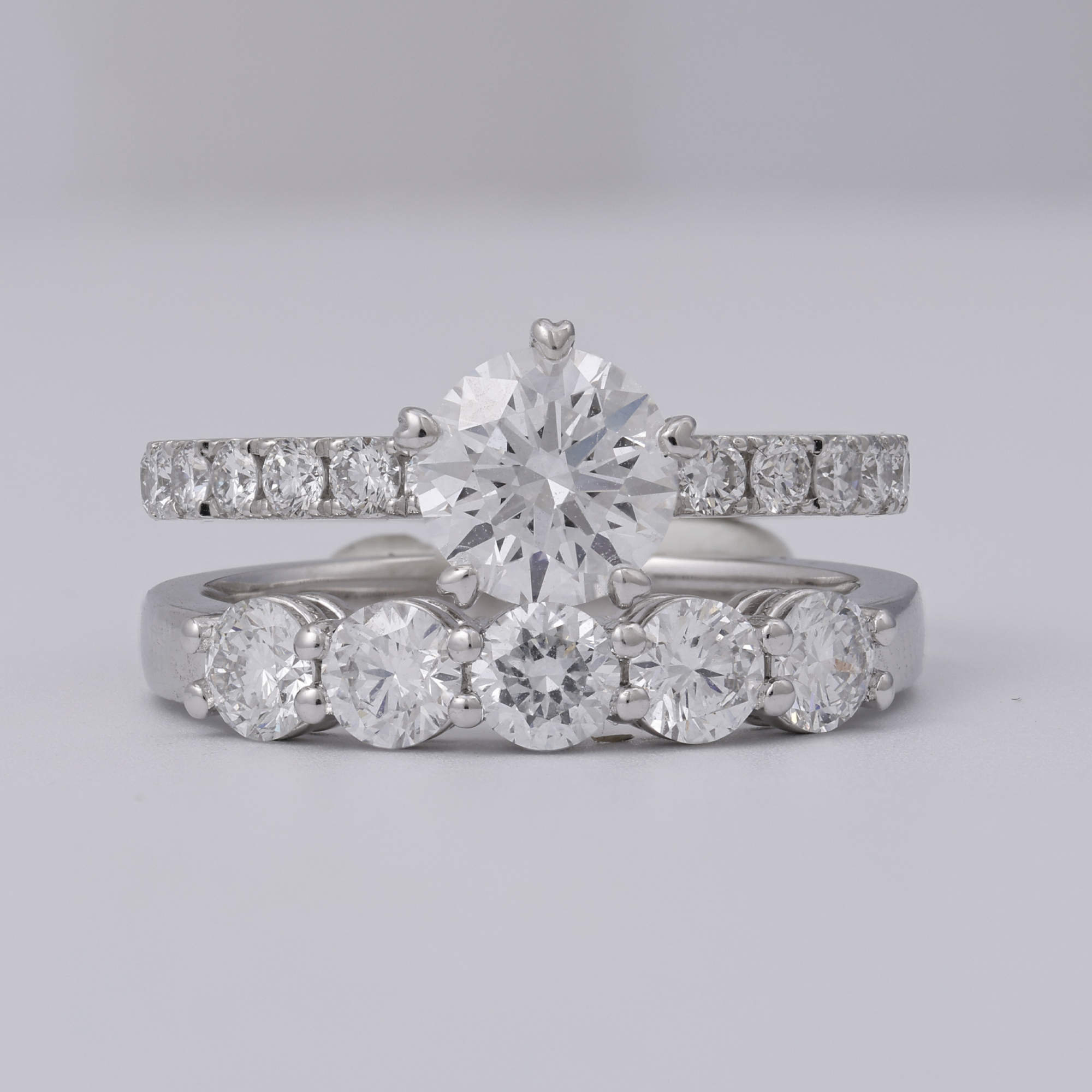 Raw jewellery product image of diamond ring set with visible fingerprints, blue tac support and unpolished presentation before retouching Productpixels Singapore