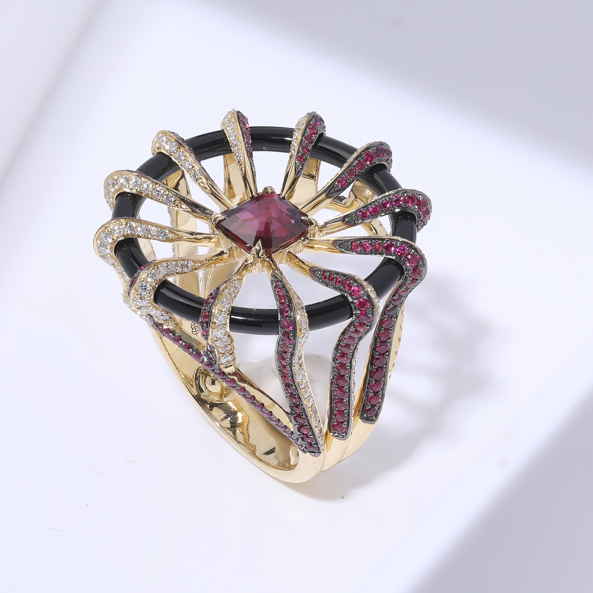 Raw jewellery product image of coloured gemstone ring with visible fingerprints, uneven reflections and blue tac setup before retouching Productpixels Singapore