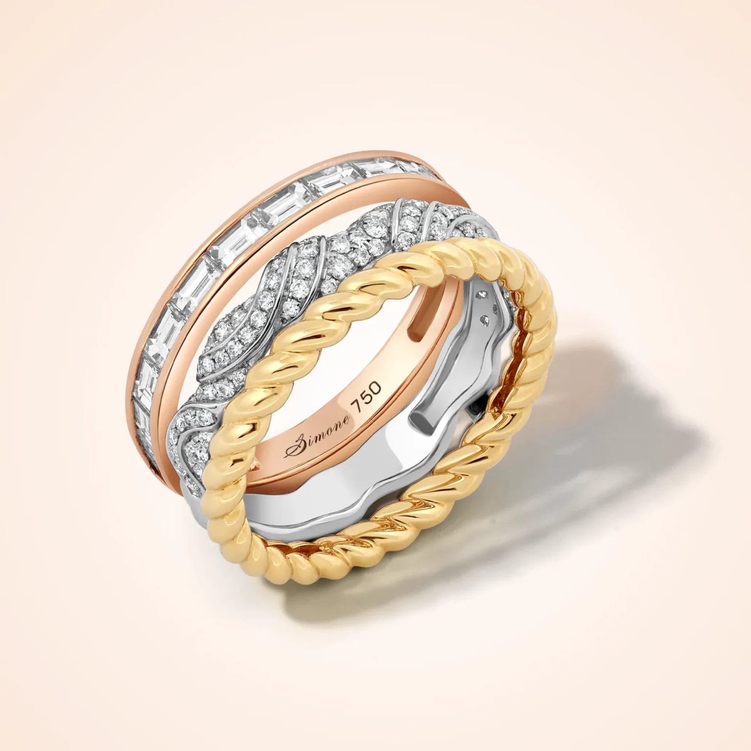 Luxury gold and diamond ring stack photography featuring multi-band design in yellow, white and rose gold, shot by ProductPixels Singapore