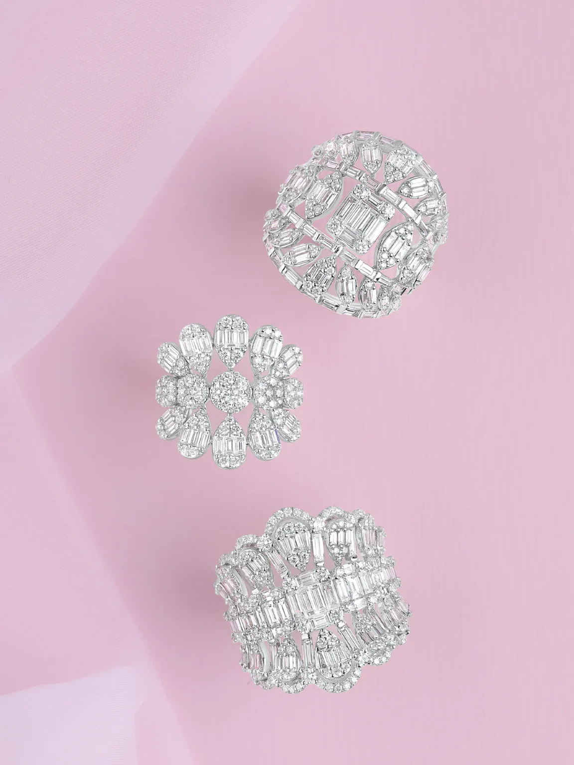 High-end jewellery photography of diamond rings showcasing detailed craftsmanship, symmetry and premium finish
