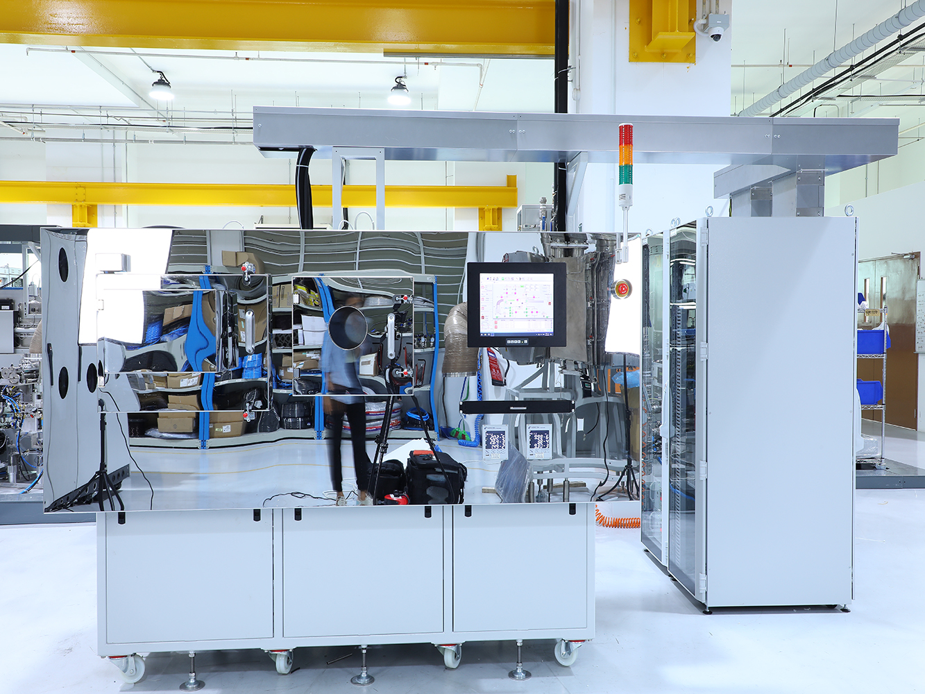 Large industrial machine photographed in a manufacturing facility before commercial retouching and background cleanup.